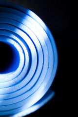 Yoga and Pilates mat rolled up on the floor