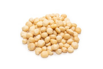 Macadamia nuts isolated on white background.
