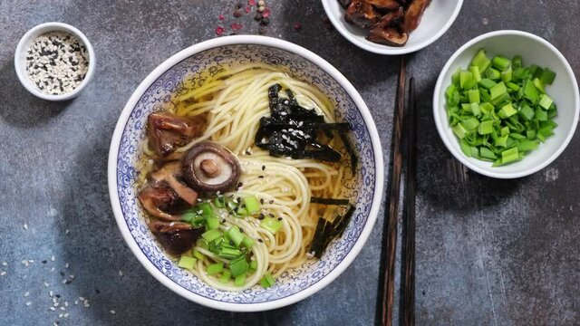 Vegetarian asian noodle soup Ramen with shiitake mushrooms