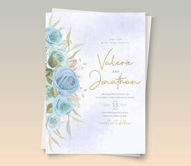 Modern wedding card with blue floral decoration