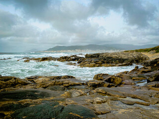 waves crashing on rocks