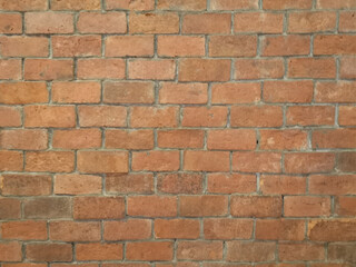 brown brick block wall show Pattern stack block rough surface texture material background Weld the joints with cement grout