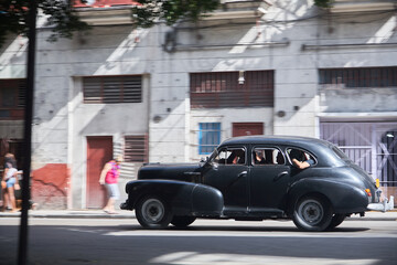 Plakat Driving vintage car in Cuba. Havana.