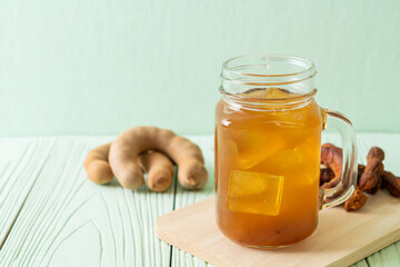 Delicious sweet drink tamarind juice and ice cube