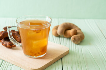 Delicious sweet drink tamarind juice and ice cube