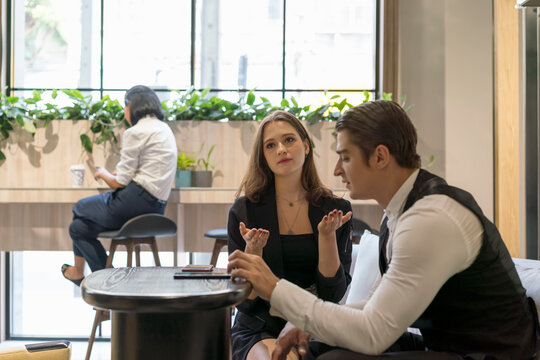 Couples are arguing in a hotel because men are not interested.