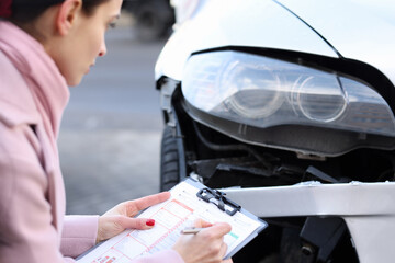 An insurance agent describes damage to motor vehicle
