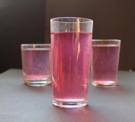 Compote juice mors milk nail pink on a black gray background with space for text and copyspace © Кристина Шоба