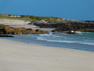 beautiful ireland beach with sunshine and blue sky