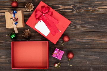 christmas holiday gift shopping background. view from above with copy space. craft paper present boxes tied from rope on blue background, top view. flat lay composition for birthday.