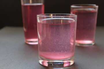 Compote juice mors milk nail pink on a black gray background with space for text and copyspace © Кристина Шоба