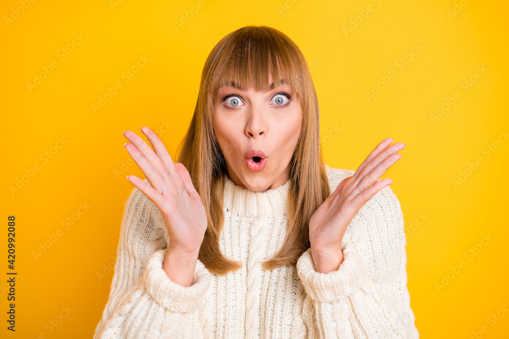 Wall mural portrait of shocked lady hands palms up open mouth disbelief wear pullover isolated on yellow color 