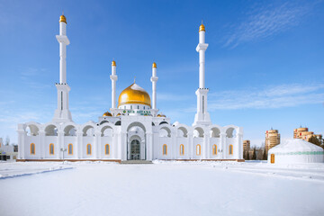 Fototapeta na wymiar The Nur-Astana Mosque in Nur-Sultan, the capital of Kazakhstan. Winter time.