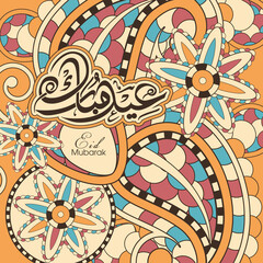 Arabic Calligraphic text of Eid Mubarak for the Muslim community festival celebration.