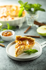 Traditional homemade apple tart with apricot jam