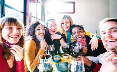 Friends taking selfie at winery bar drinking wine glass with open face mask - People having fun together at restaurant reopening - Selective focus on middle guys and girls with bright backlight filter
