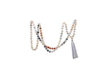 Handmade sacred mala beads isolated on a pure white background. Rudraksha mala seed that increase...