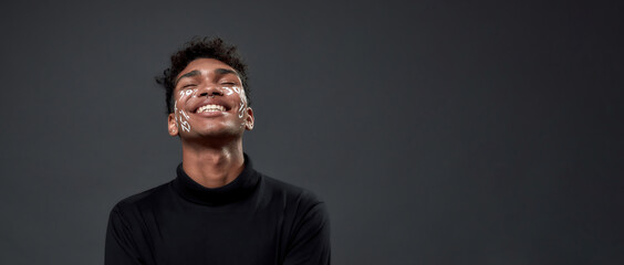 African american man with percents inscription on face