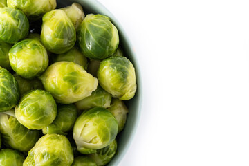 Set of brussel sprouts in a bowl isolated on white background.Top view.Copy space