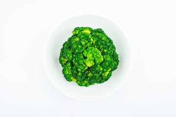 Broccoli on a dish on white background