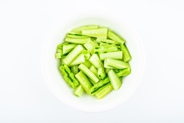 A pot of cut cucumber strips