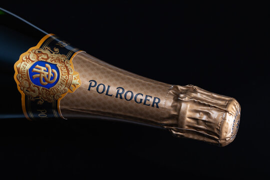 The detail of bottle Pol Roger champagne  on the black  background.