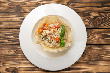 Risotto with bacon, cherry tomatoes and basil