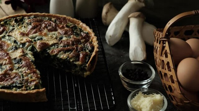 Delicious Homemade cheesy spinach quiche pie.