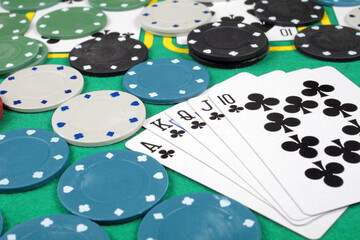 Poker chips cards table winning royal flush - obrazy, fototapety, plakaty