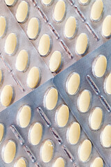 convex pills in a packaged