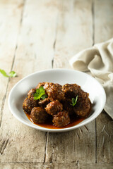 Traditional homemade meatballs with fresh basil