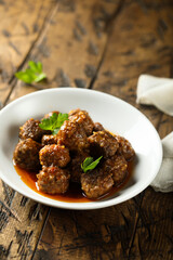 Traditional homemade meatballs with fresh basil