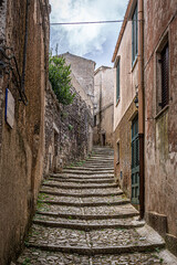 Tight and steep steps in Erice. Sicily, Italy.