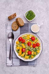 Pasta with vegetables and green sauce