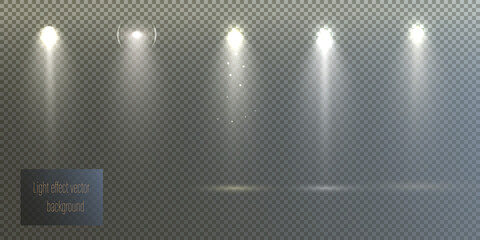 Spotlights set isolated on transparent background. Vector glowing light effect with golden rays and lens flares.	