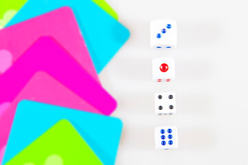 Multicolored cards with gambling dices. Casino betting and gambling concept