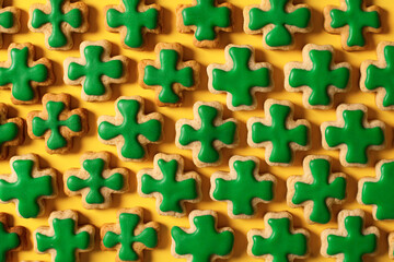 Saint Patrick's day concept with green cookies shamrock pattern