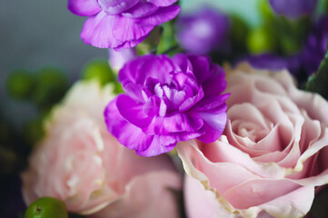 Tender pink bouquet with roses and other flowers. Wedding celebration
