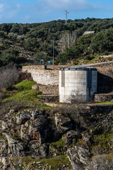 Fototapeta na wymiar View of the dam of El VIllar a sunny day in Madrid, Spain