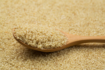 Sesame seeds in spoon