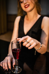 young woman with a glass of wine