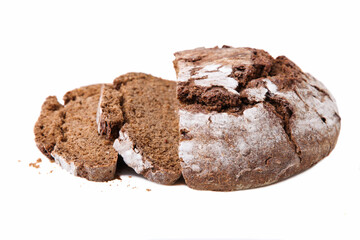 Loaf of round rye bread, cut into slices