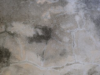 Old cement or concrete outdoor wall with stains and moldy for background.