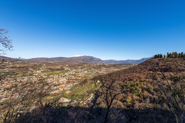 Obraz premium Aerial View of the Small Garda Town, tourist resort on the coast of Lake Garda, view from the Rocca di Garda, small hill overlooking the lake. Verona province, Veneto, Italy, Europe.