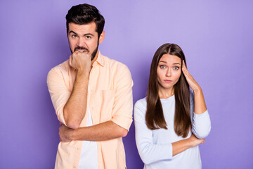 Photo of upset brunette man and woman conflict break-up wear orange shirt blue pullover isolated on violet color background