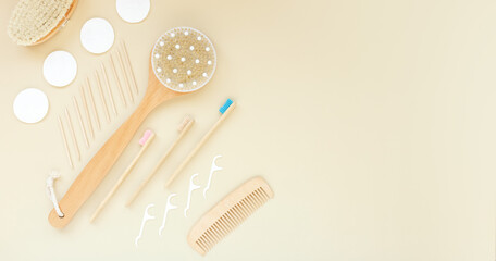 Body or face care concept. Beauty treatments at home or in the salon. Minimal flat lay over beige background.brush for dry massage,toothbrush,hair brush. Top view,flat lay. Place for text.