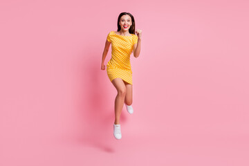 Full size photo of attractive young crazy woman jump air run fast sale isolated on pastel shine...