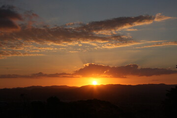 Beautiful sunset in the peaceful valley, golden sunlight