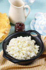 Bowl of homemade healthy cottage cheese for breakfast