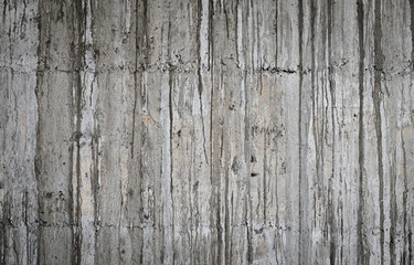 Art Empty of the splendor of a concrete wall with a flowing cement, surface or texture for design background.